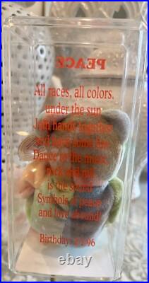 Rare, Authenticated, 1996 ty beanie baby Peace, Mint, Retired, low Production